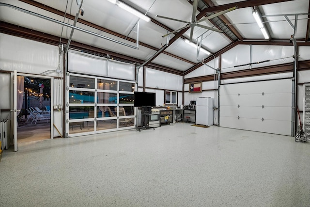 garage with freestanding refrigerator