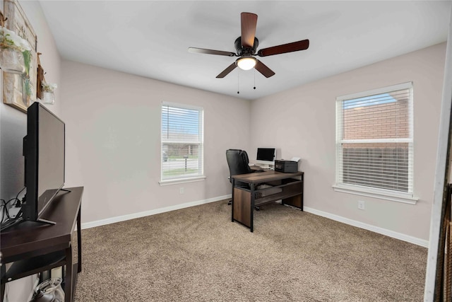 home office with carpet flooring and ceiling fan