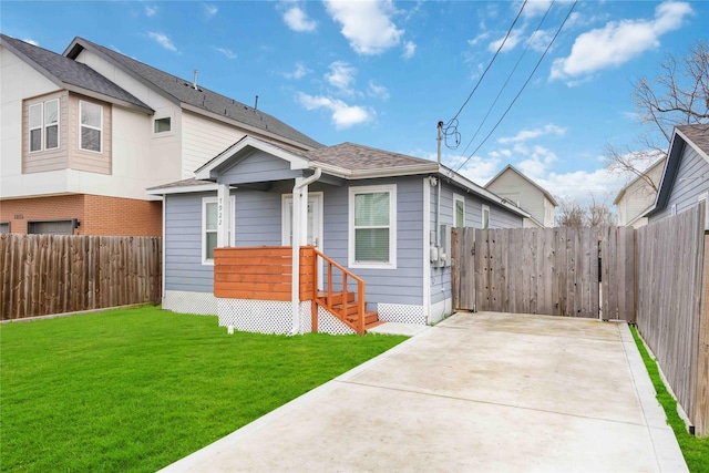 bungalow with a front yard