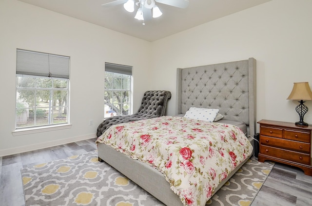 bedroom featuring ceiling fan and wood-type flooring