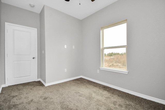 unfurnished room featuring carpet floors and ceiling fan