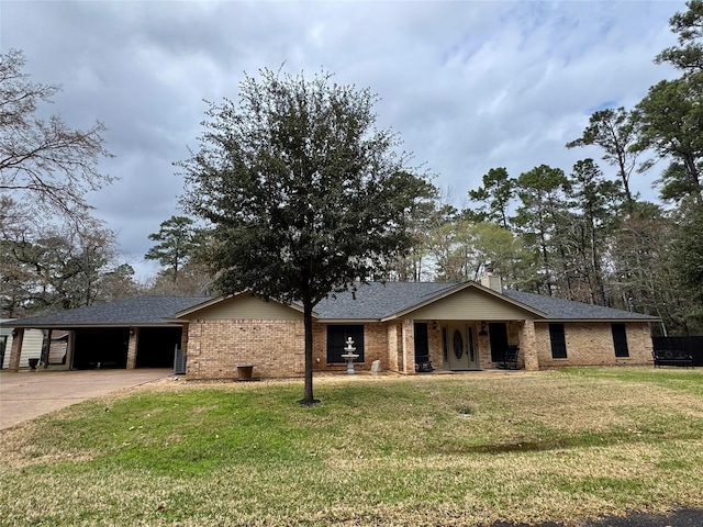 single story home featuring a carport and a front yard