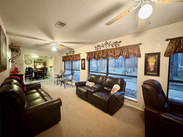 125 Clear Spgs, Trinity, TX 75862 - carpeted living area featuring a ceiling fan and baseboards