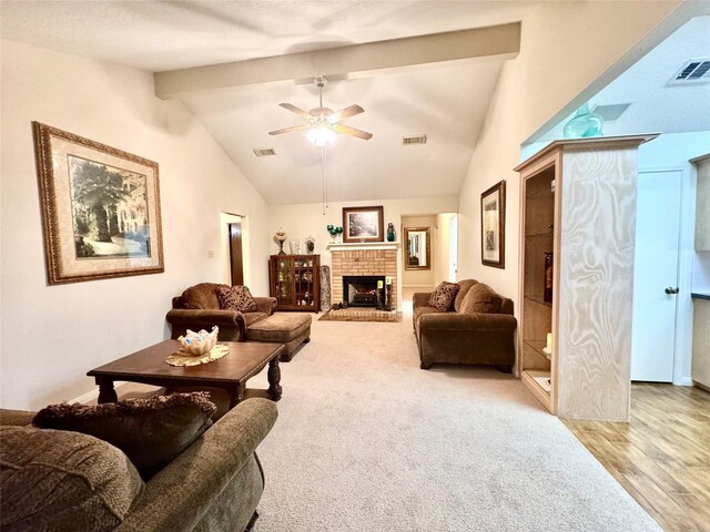 125 Clear Spgs, Trinity, TX 75862 - living room with a fireplace, a ceiling fan, and wood finished floors