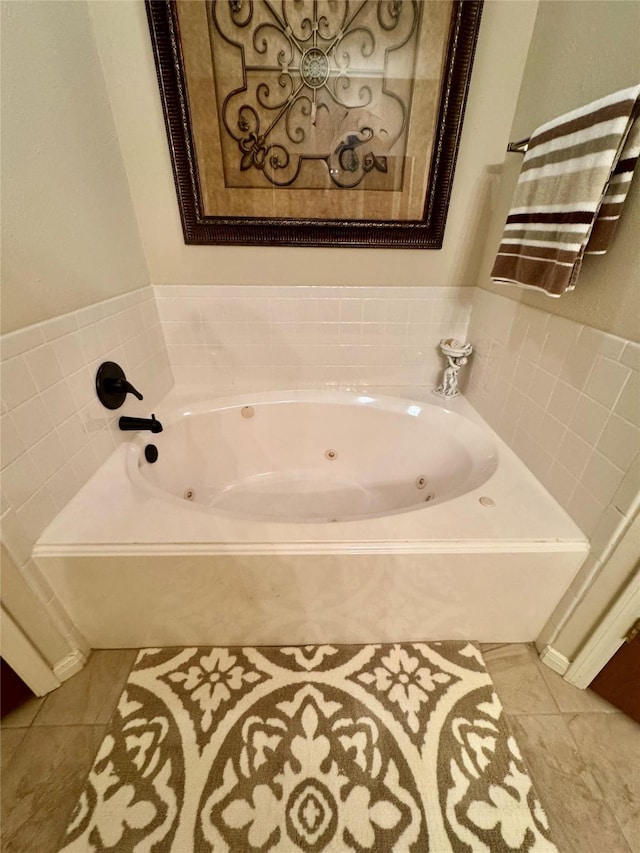 125 Clear Spgs, Trinity, TX 75862 - bathroom featuring tile patterned floors and a jetted tub