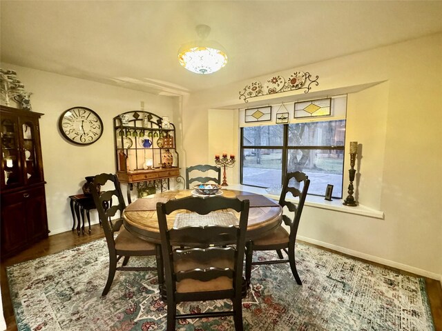 125 Clear Spgs, Trinity, TX 75862 - dining area featuring baseboards and wood finished floors