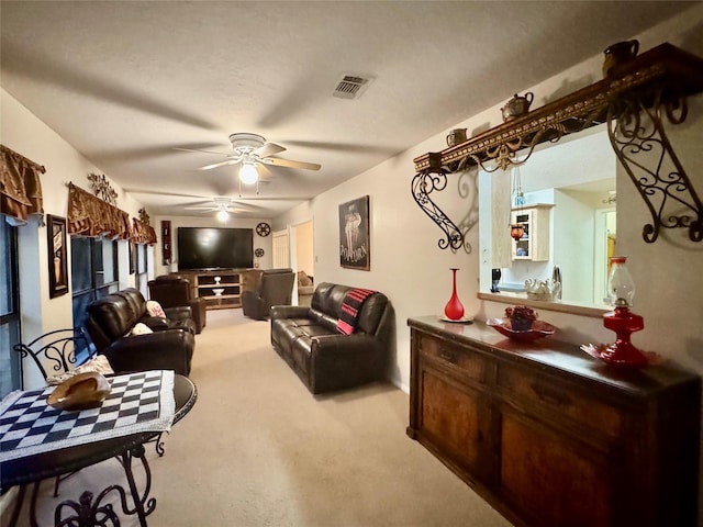 125 Clear Spgs, Trinity, TX 75862 - living room with carpet floors and a ceiling fan