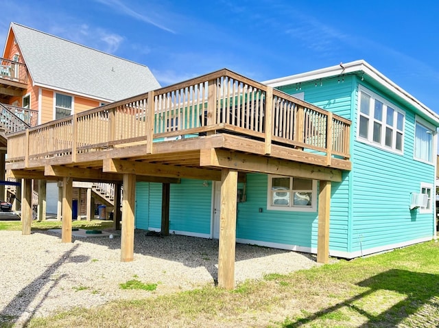 rear view of house with a deck