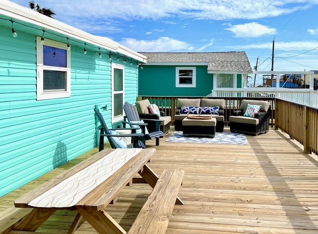 wooden terrace featuring an outdoor hangout area