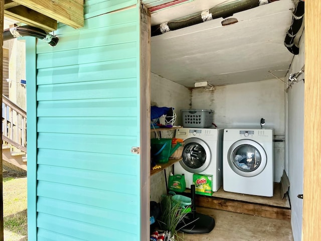 laundry area featuring washing machine and dryer