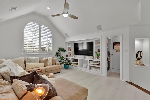 living room featuring vaulted ceiling, built in features, ceiling fan, and light hardwood / wood-style flooring