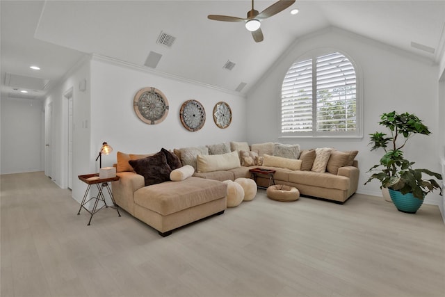 living room featuring lofted ceiling, light hardwood / wood-style floors, and ceiling fan