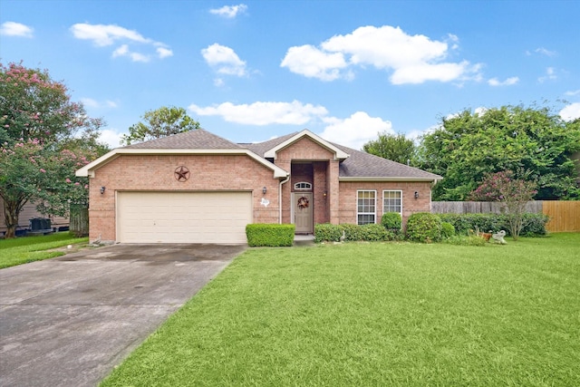 ranch-style house featuring a garage and a front yard