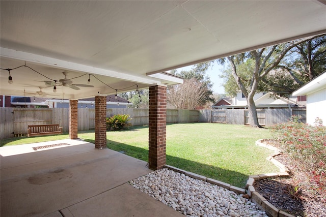 view of patio with ceiling fan