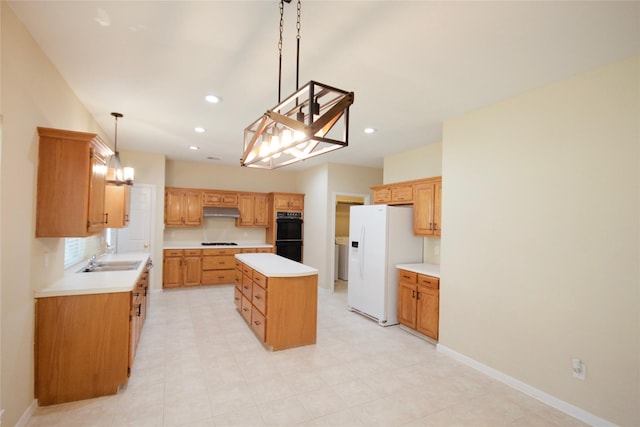 kitchen with a kitchen island, double oven, sink, hanging light fixtures, and white fridge with ice dispenser