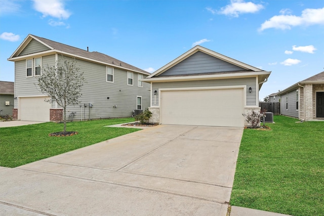 view of front of property featuring a garage, central AC unit, and a front lawn