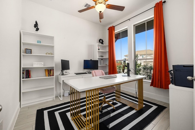 office area featuring ceiling fan and light hardwood / wood-style floors