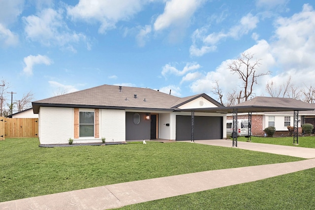 single story home featuring a garage and a front lawn