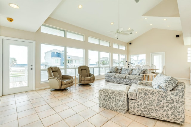 tiled living room with high vaulted ceiling