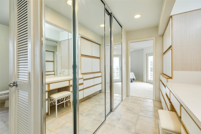 interior space featuring light tile patterned flooring