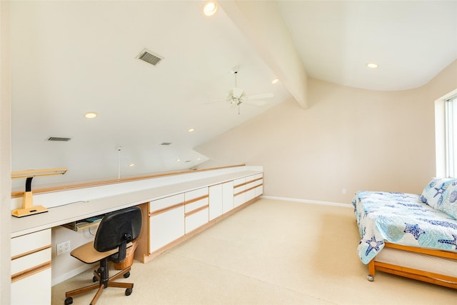 office space with built in desk, lofted ceiling with beams, light colored carpet, and ceiling fan