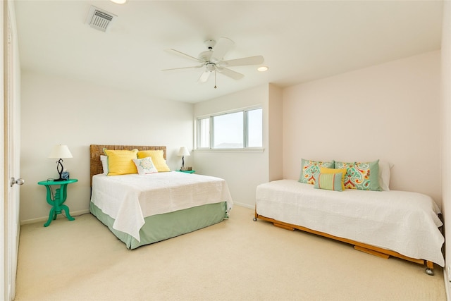 bedroom with ceiling fan and carpet