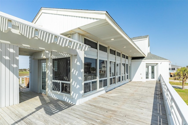 wooden deck featuring french doors