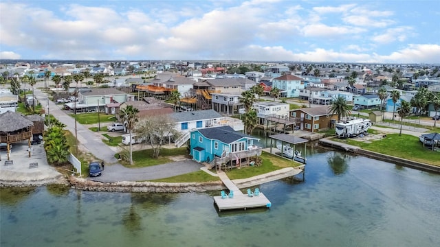 aerial view featuring a water view and a residential view