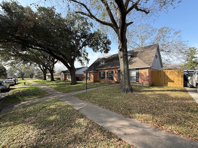 ranch-style house with a front yard