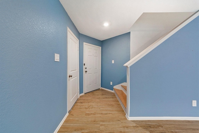 entrance foyer featuring light hardwood / wood-style floors