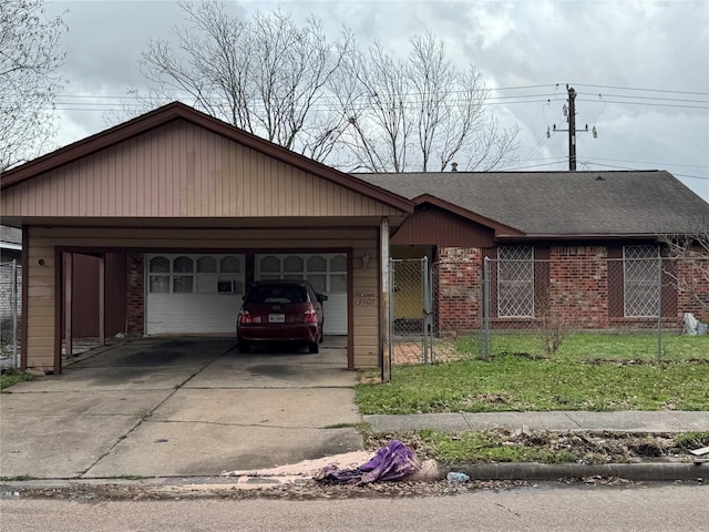 ranch-style house featuring a front yard and a carport