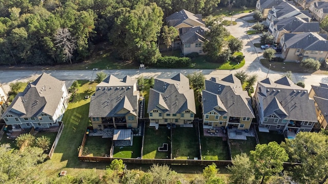 birds eye view of property with a residential view