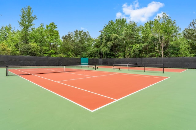 view of sport court featuring community basketball court and fence