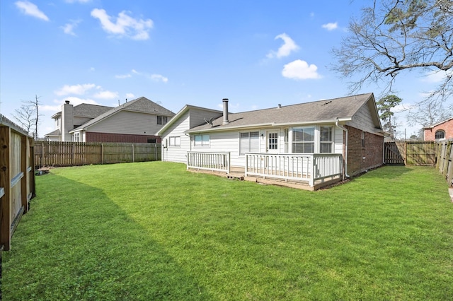 615 Harbor Mist Dr, Crosby, TX 77532 - back of house featuring a yard and a wooden deck