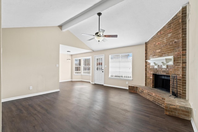 615 Harbor Mist Dr, Crosby, TX 77532 - unfurnished living room with dark wood-type flooring, a brick fireplace, vaulted ceiling with beams, and ceiling fan