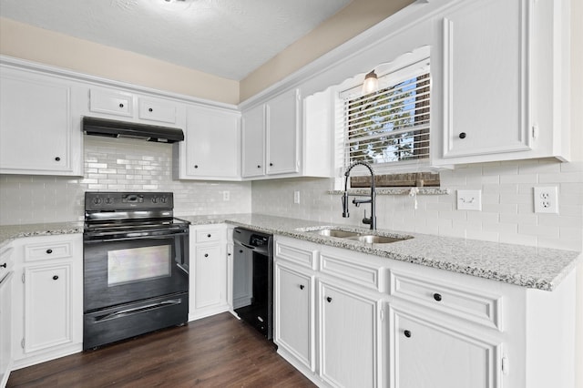 615 Harbor Mist Dr, Crosby, TX 77532 - kitchen with white cabinetry, black appliances, sink, dark hardwood / wood-style floors, and decorative backsplash
