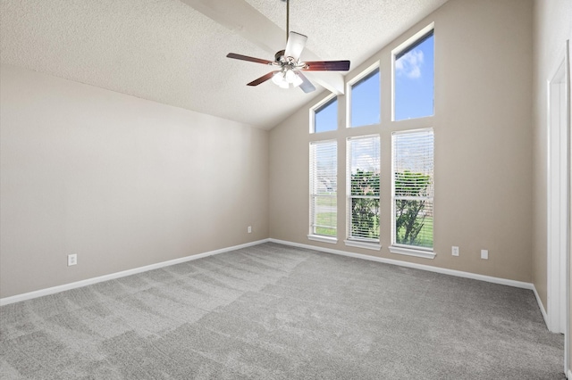 615 Harbor Mist Dr, Crosby, TX 77532 - empty room featuring ceiling fan, high vaulted ceiling, light carpet, and a textured ceiling