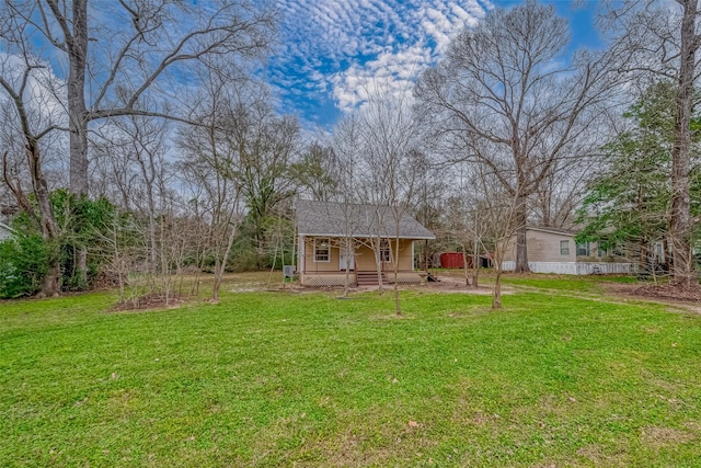 exterior space with a porch and a front lawn