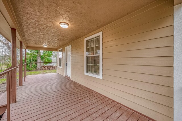 deck with covered porch