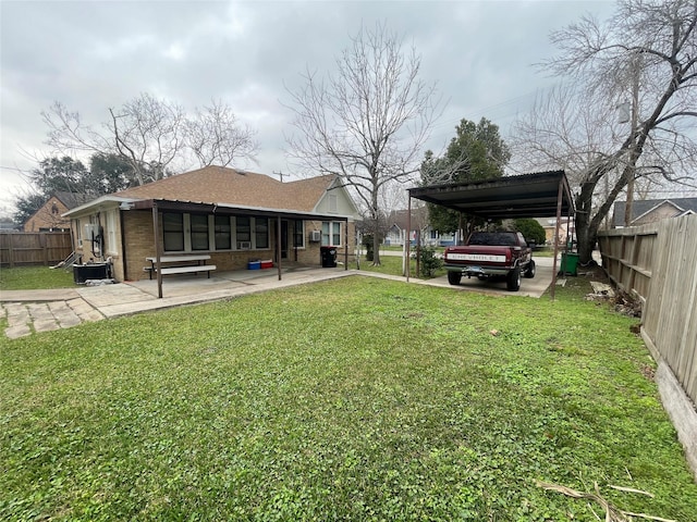 view of yard featuring a carport