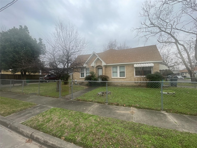 bungalow-style house featuring a front yard