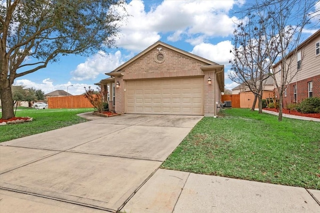 view of front of property with a garage and a front lawn