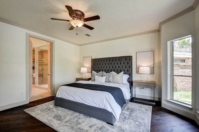 bedroom featuring dark wood-type flooring, ornamental molding, and multiple windows