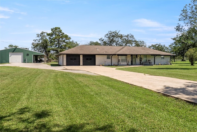 ranch-style home featuring a garage and a front yard