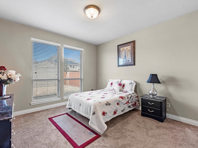 bedroom featuring carpet