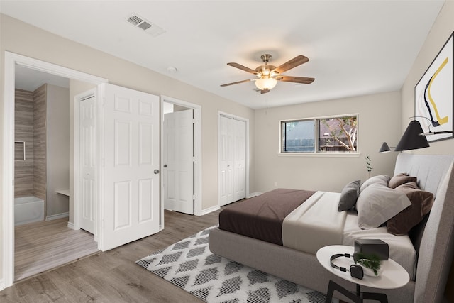 bedroom featuring hardwood / wood-style flooring and ceiling fan