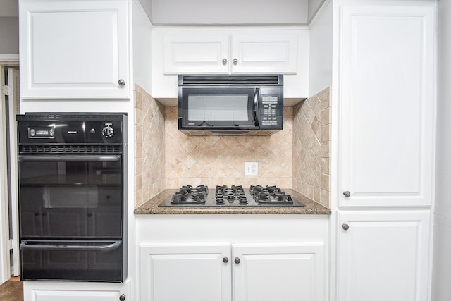 7018 Drowsy Pine Dr, Houston, TX 77092 - kitchen featuring white cabinets, dark stone counters, decorative backsplash, and black appliances