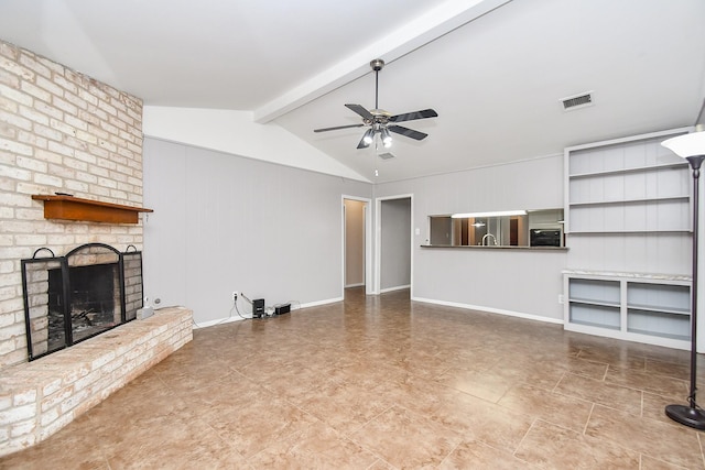 7018 Drowsy Pine Dr, Houston, TX 77092 - unfurnished living room with ceiling fan, vaulted ceiling with beams, sink, and a fireplace