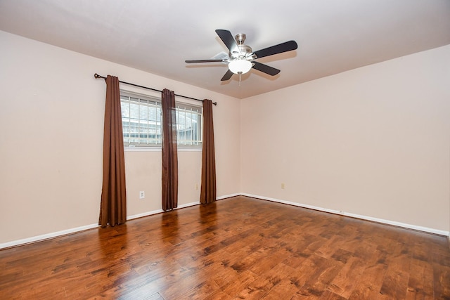 7018 Drowsy Pine Dr, Houston, TX 77092 - spare room featuring dark wood-type flooring and ceiling fan