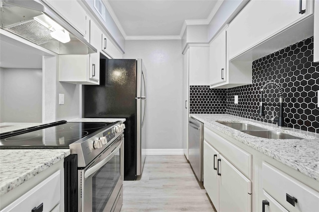 kitchen featuring sink, ventilation hood, ornamental molding, stainless steel appliances, and white cabinets